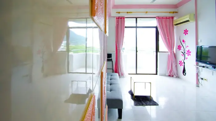 The bright end of the living room, looking out
